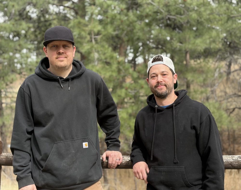 Drew and Derek, co-owners of Two Neighbors Outdoor Services in Elizabeth, CO